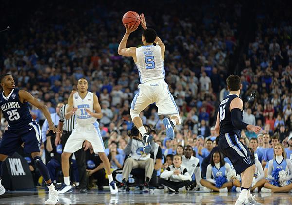 North Carolina's Marcus Paige (5) makes an off-balance 3-pointer to tie the game during the second half on Monday at NRG Stadium in Houston. PHOTO BY CHUCK LIDDY/RALEIGH NEWS AND OBSERVER/TNS
