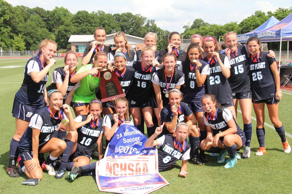 The 2018 women's soccer team celebrates its championship Saturday in Raleigh. PHOTO BY MADISON MURRY/Shorelines Yearbook