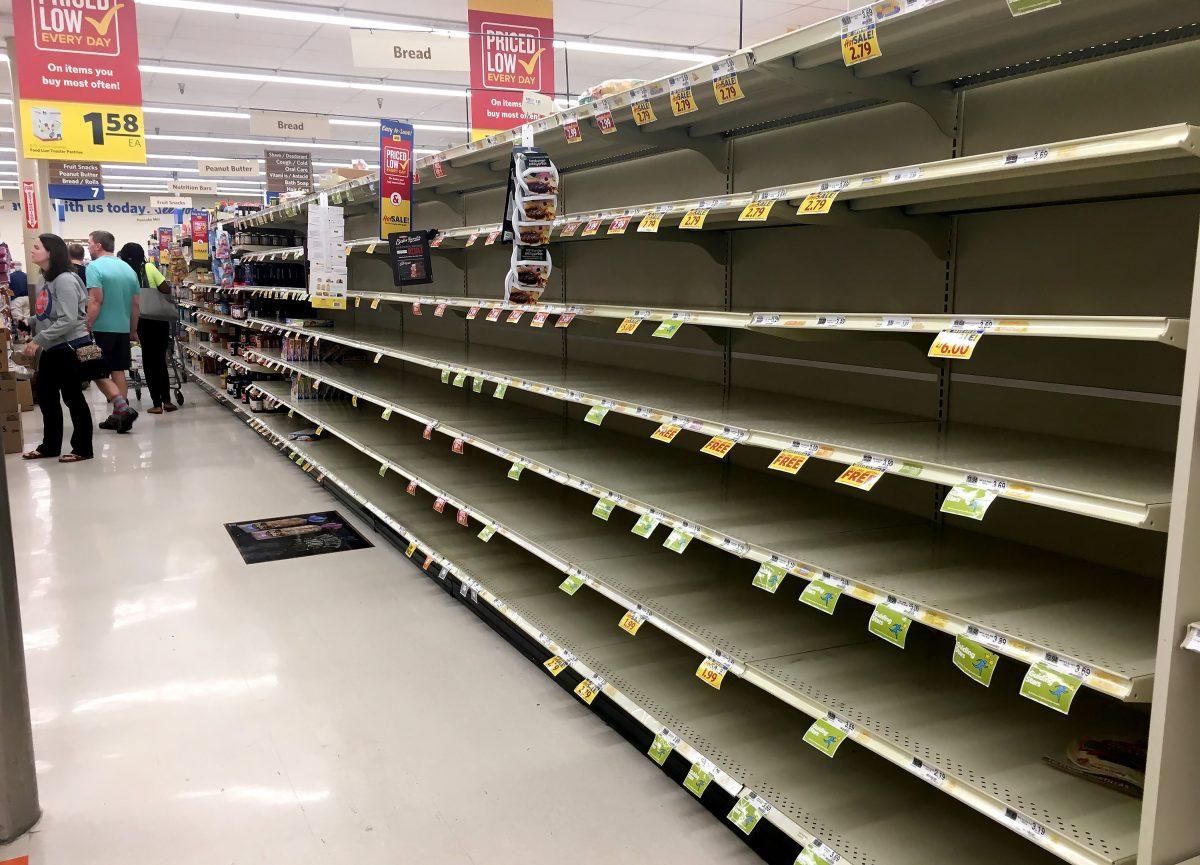 The bread shelves at the Woodcroft Food Lion are empty Monday, Sept. 10, 2018 in Durham, N.C.  Residents of eastern and central North Carolina are stripping grocery shelves and emptying supplies of gasoline as Hurricane Florence approaches the Old North State. (Chuck Liddy/Raleigh News &amp; Observer/TNS)