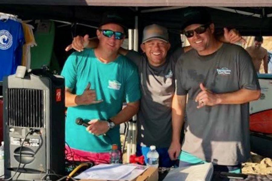 Lifelong surfing friends (from left) Greg Sherman, Jason Breiholz and Stephen Lamm enjoy a fun moment together at the Throwdown Surf Classic. Submitted Photo