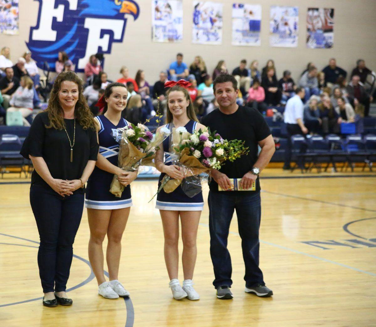 Twins Shelby and Hayley Miller cheered on the FFHS team together and will be teammates once again at UNCW.