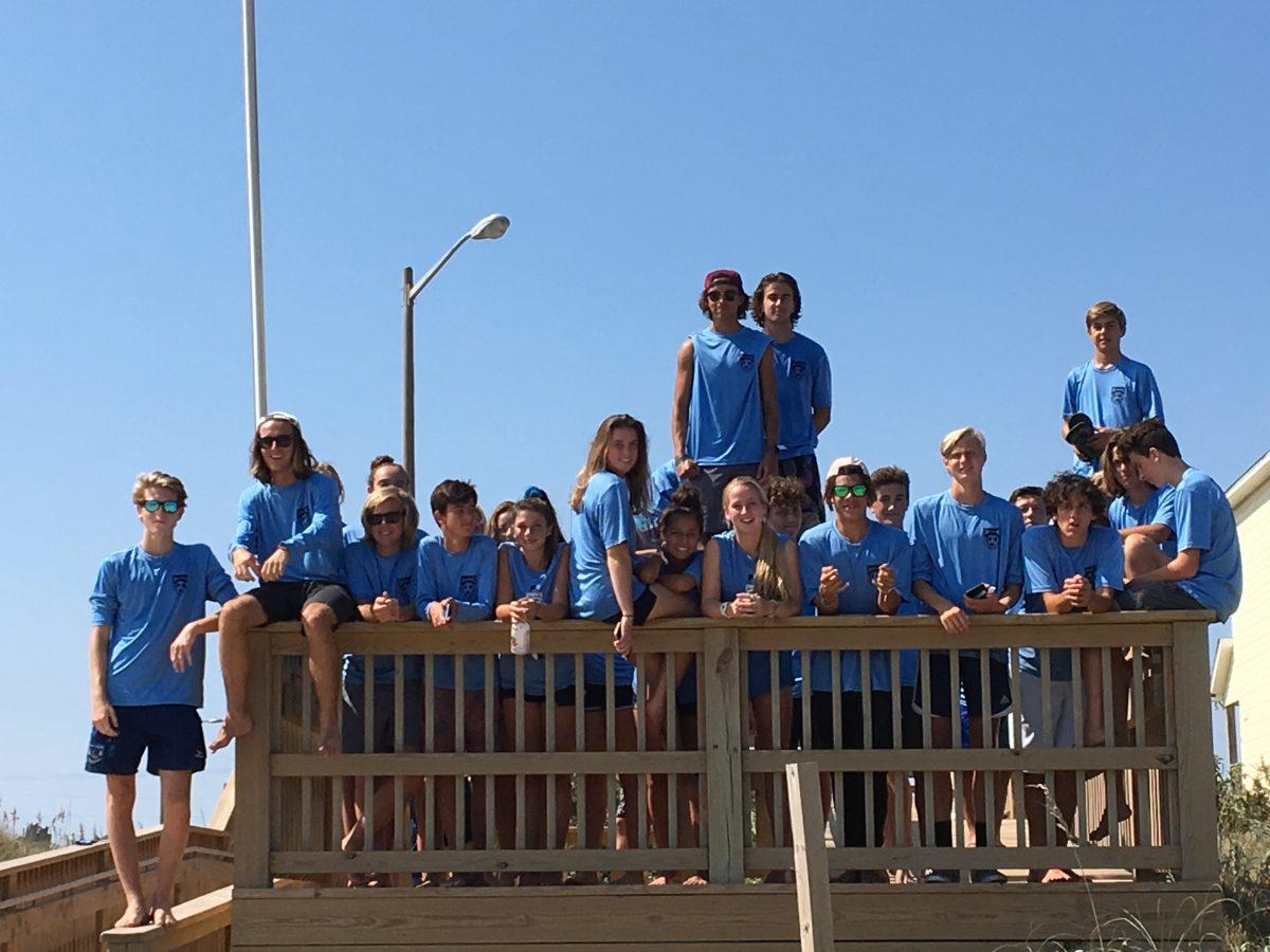 Members of the men's and women's soccer teams take a group photo after picking up trash at local beaches on Sept. 28. Students often are part of a community-wide effort to keep Outer Banks beaches and other popular spots clean. PHOTO SUBMITTED BY JUAN RAMIREZ