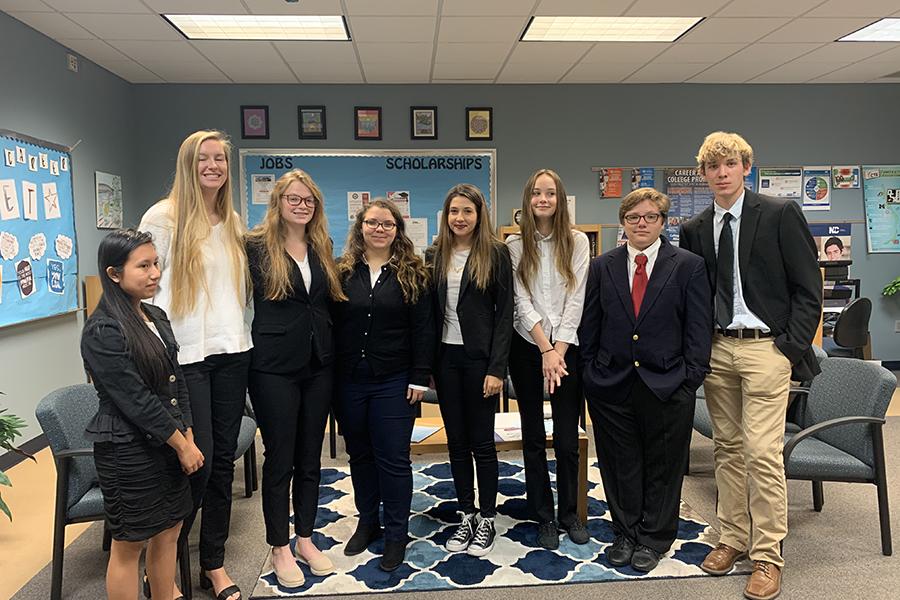 HOSA members (from left the right) Daisy Morales Bravo, Judy Williams, Abby Hite, Jenna Sullivan, Jessica Dugita, Leila Smith, JP Kovacs and Mason Rubendall pose for a group picture. 