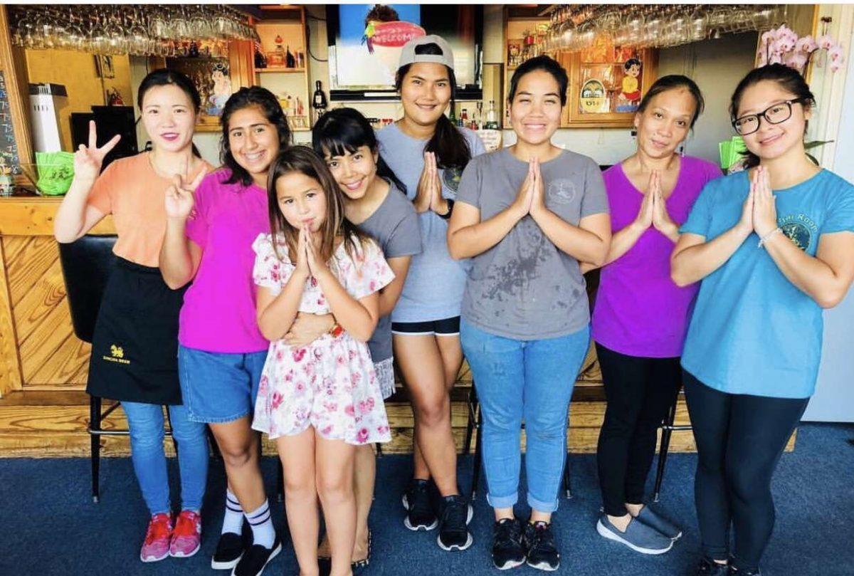 Junior Ingris Jimenez poses for a picture with Thai students who visited the Thai Room Restaurant. PHOTO SUBMITTED BY INGRIS JIMENEZ