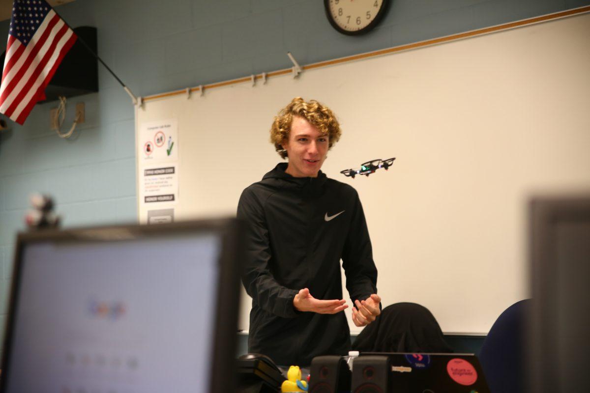 Sophomore Cole Eldridge watches his drone take flight in Nancy Stevens' Python Programming class. Drones continues to grow in popularity in the classroom and everyday life. PHOTO BY EMMY TRIVETTE/Nighthawk News