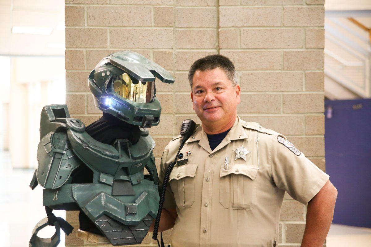 School Resource Officer Edward Cottrell holds a 'Halo'-inspired Halloween costume he made for one of his sons. It is a tradition in their family for Cottrell to handcraft Halloween costumes for his children. This one can be found in his office at FFHS. PHOTO BY ALIZA SNOW/Nighthawk News