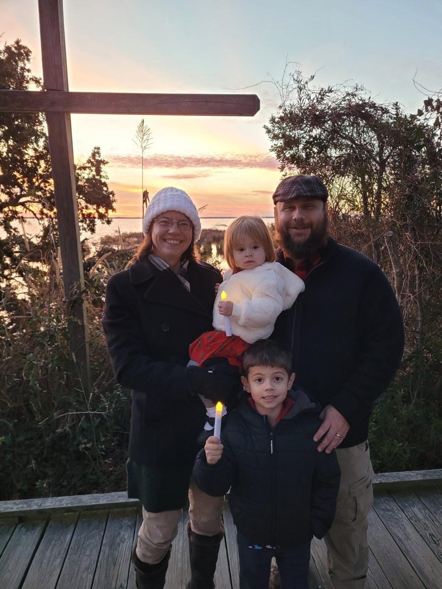 Amy Denson with her family at sunset.